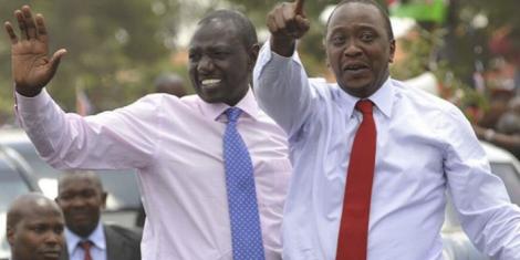 President Uhuru Kenyatta (in red tie) with his Deputy William Ruto during the 2013 elections campaigns
