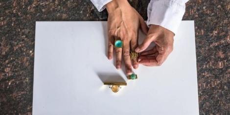 A photo of Ami Doshi showcasing some of the rings made in her workshop in Nairobi.