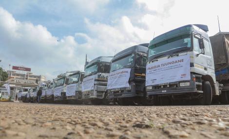 Trucks carrying foodstuff worth over Ksh100 million to be used towards Safaricom's Pamoja Tuungane campaign. 