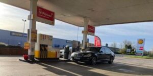 A Car refilling at Shell Petrol station with V-Power Fuel