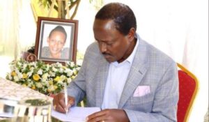 Wiper Leader Kalonzo Musyoka signs the condolence book during the burial of Johnson Muthama's daughter on Monday, May 2, 2022.