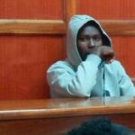 Sim-swap fraud suspect, Gideon Mark who is accused of stealing Ksh597,100 from a police OCPD in court on Monday, May 23, 2022.