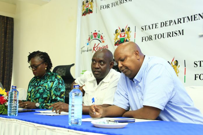 Mombasa Tourism Chief Officer Pauline Oginga, Tourism Principal Secretary John Ololtuaa and Mombasa county commissioner Mohamed Noor at Mombasa beach hotel on Wednesday.