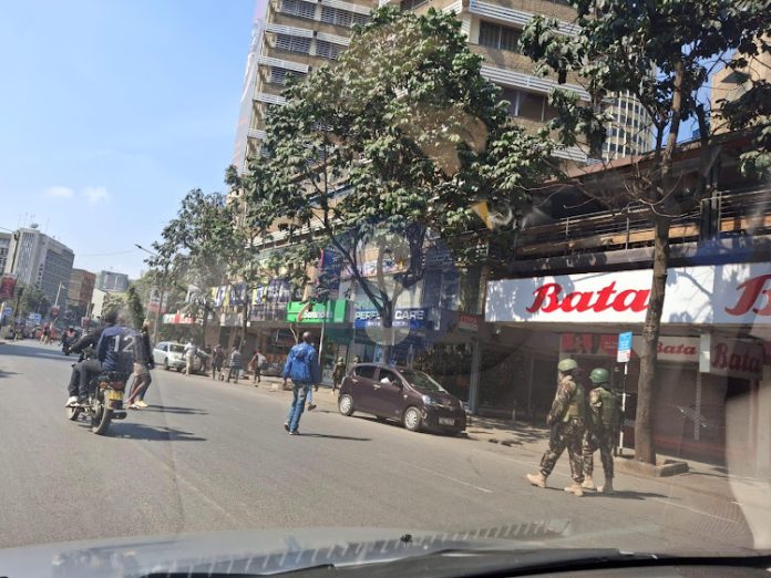 Nairobi Central Business District on July 4, 2024. Several shops remained closed as police patrolled the streets.