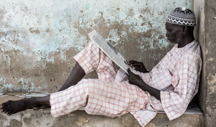 Man reading a newspaper